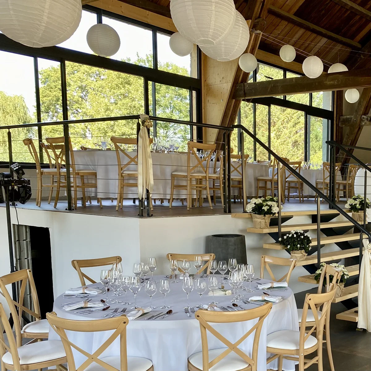 a covered patio with a couch and chairs